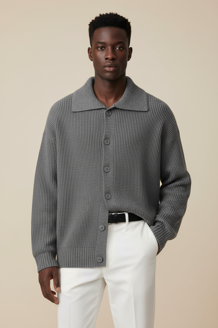 Black man wearing untucked gray corduroy cardigan