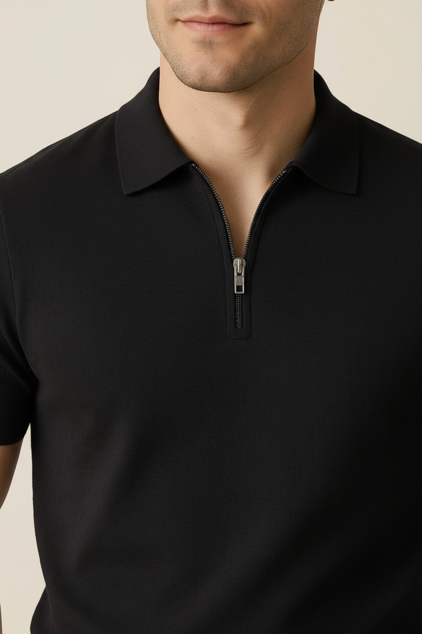 Close-up detail of black polo shirt
